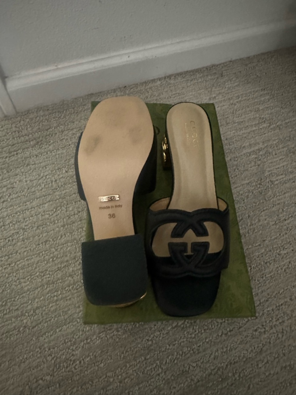 Curated Luxury Black Slide Sandals with Gold Heel Detail